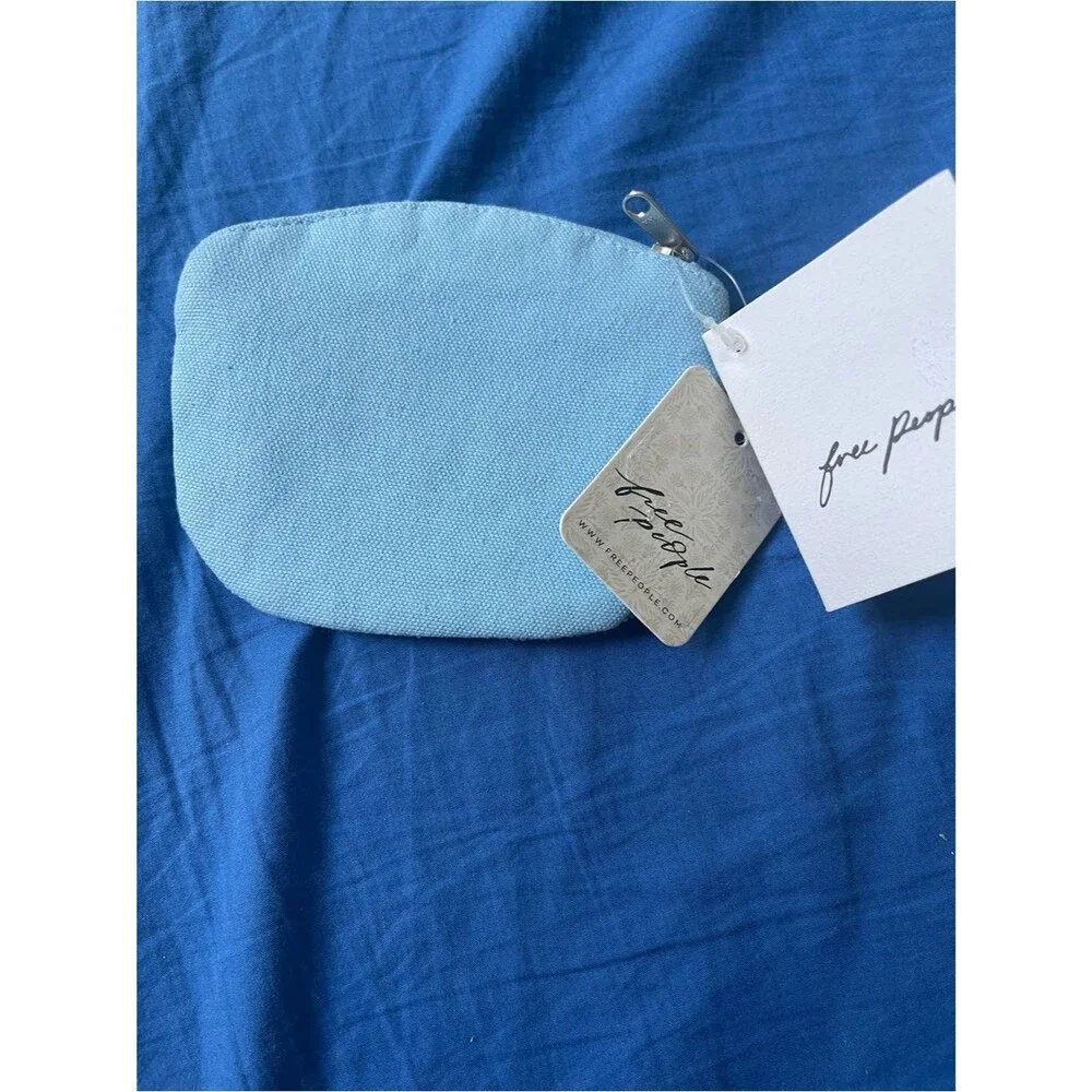Free People Swan Lake breaded wallet blue NWT